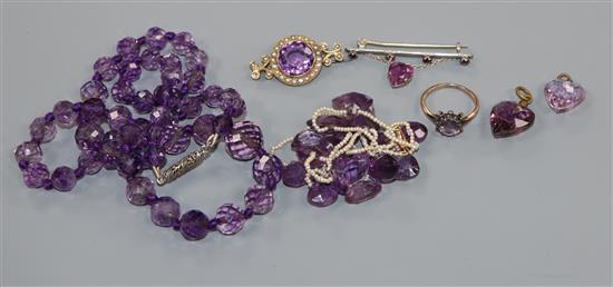 Seven items of mainly early 20th century amethyst set jewellery including ring, pendants and seed pearl necklace.